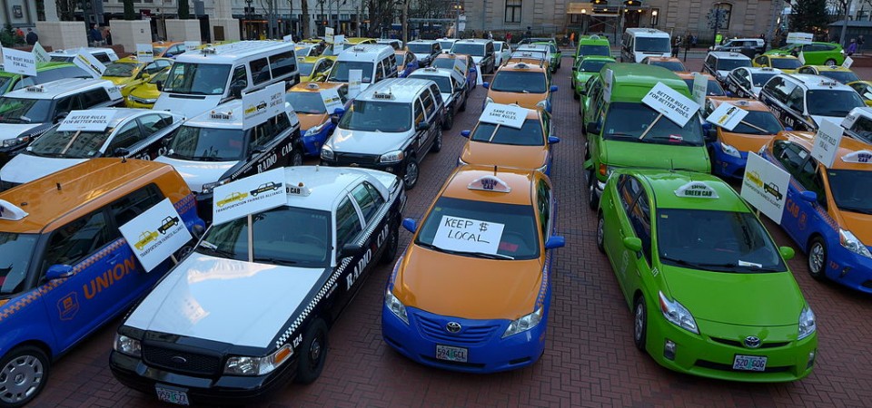 Uber under assault around the world as taxi drivers fight back